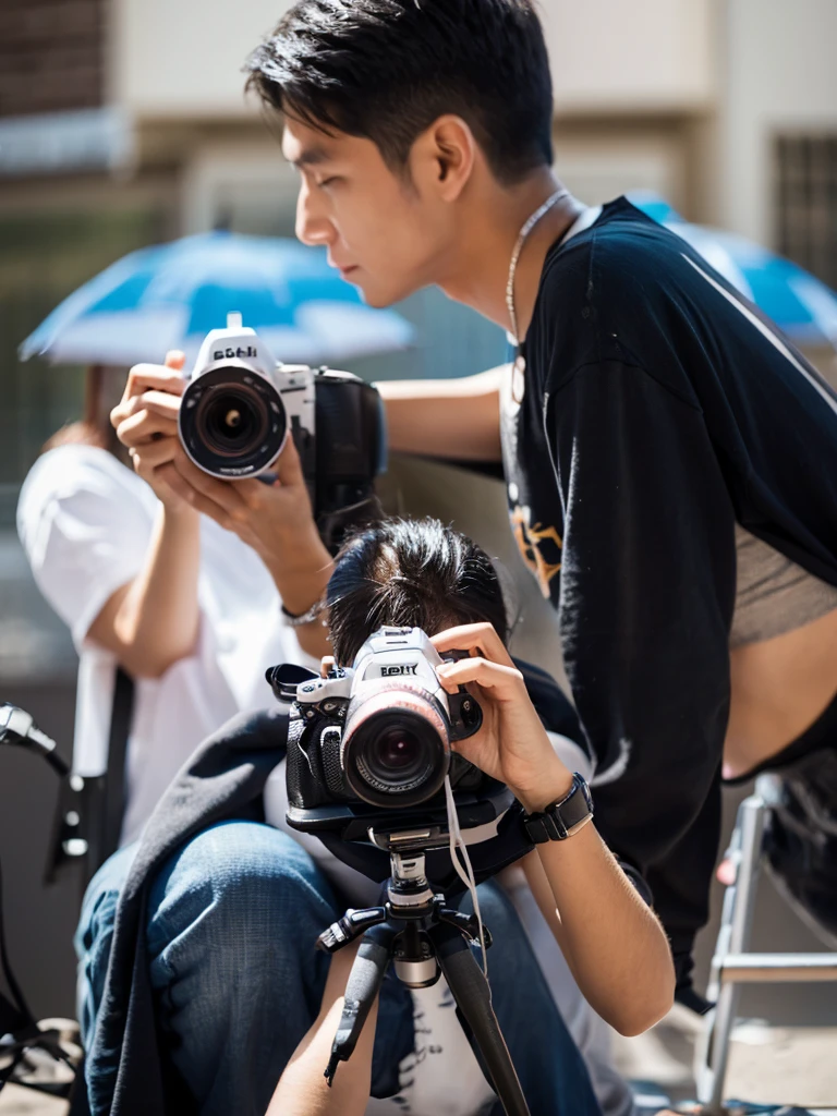 A photographer guy takes a picture of a model