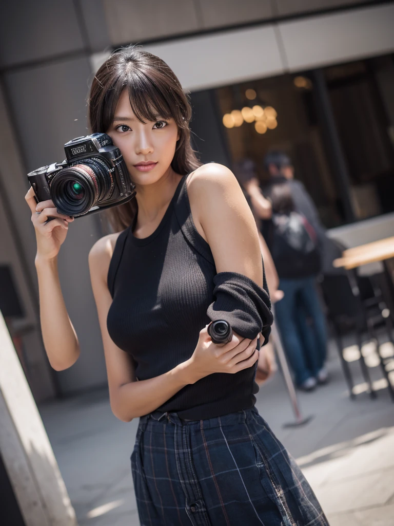 A photographer guy takes a picture of a model