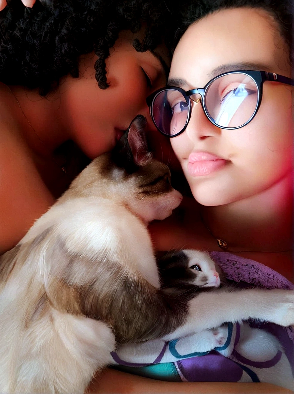 there is a couple of women lying in a bed with a cat, with cats by her side, cat in their midst, kissing together cutely, big cheeks holding her cat, with kitten on lap, Hugging, taken in 2 0 2 0, licking, Hugging her gremlings, she is holding a cat in her arms, aesthetic siamese cat