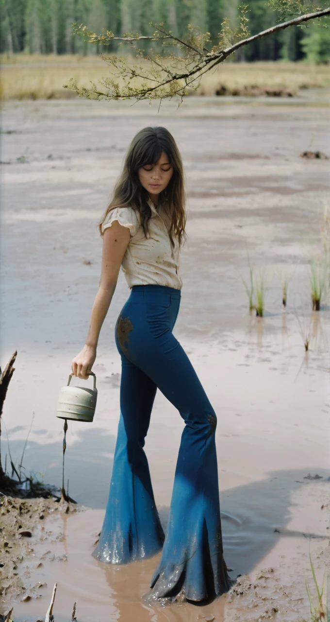70s setting, film photo of girl in [muddy, dirty]  worn-out high waisted flare leggings pants and blouse drowning in bog, flares