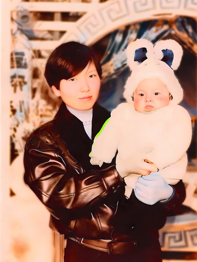 A woman holds a baby in a white bear costume with a child, With big rabbit ears,