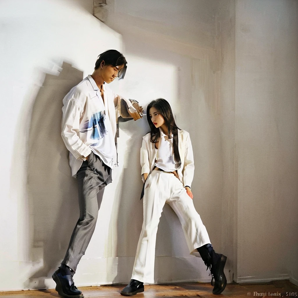 a fashionably dressed man with an air of sophistication along with his very beautiful female partner. He wore casual yet elegant clothes, consisting of a suit, stylish hat. He wore white trousers and an elegant jacket with high healing. The background is a wall with a stunning mix of ink splashes, creating a modern and artistic atmosphere. Playful ink splashes mix with the splendor of the painting, striking a harmonious balance between style and creativity. The couple's confident poses and the artist's skillful brushwork come together to create an image of unsurpassed elegance and refinement.fashion, photo