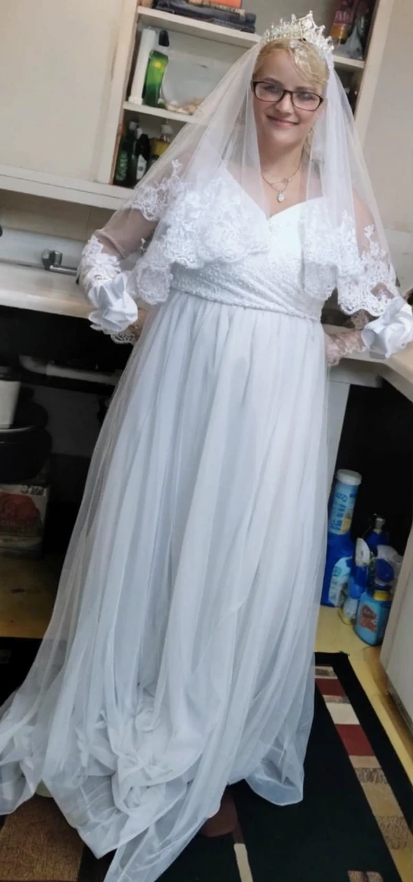 A princess next to an hourglass 