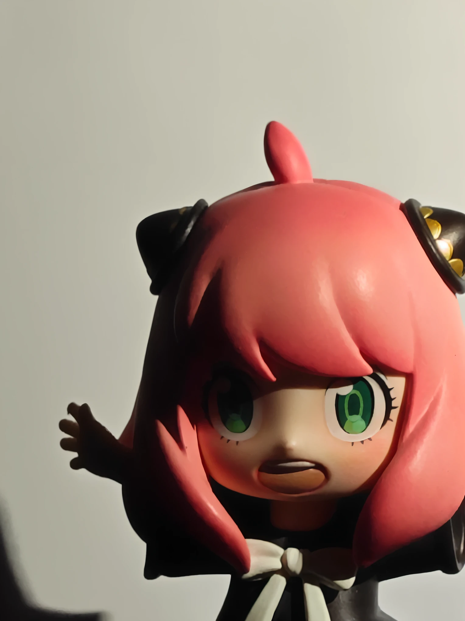 A toy for a girl with pink hair and black clothes, eyes in the style of Clay people, style as Clay people, Nekomimi, Clay people eyes, Clay people 3 d, Nendoroid, Clay people, Shot with Sony Alpha 9, Danganronpa Junko Ejima
