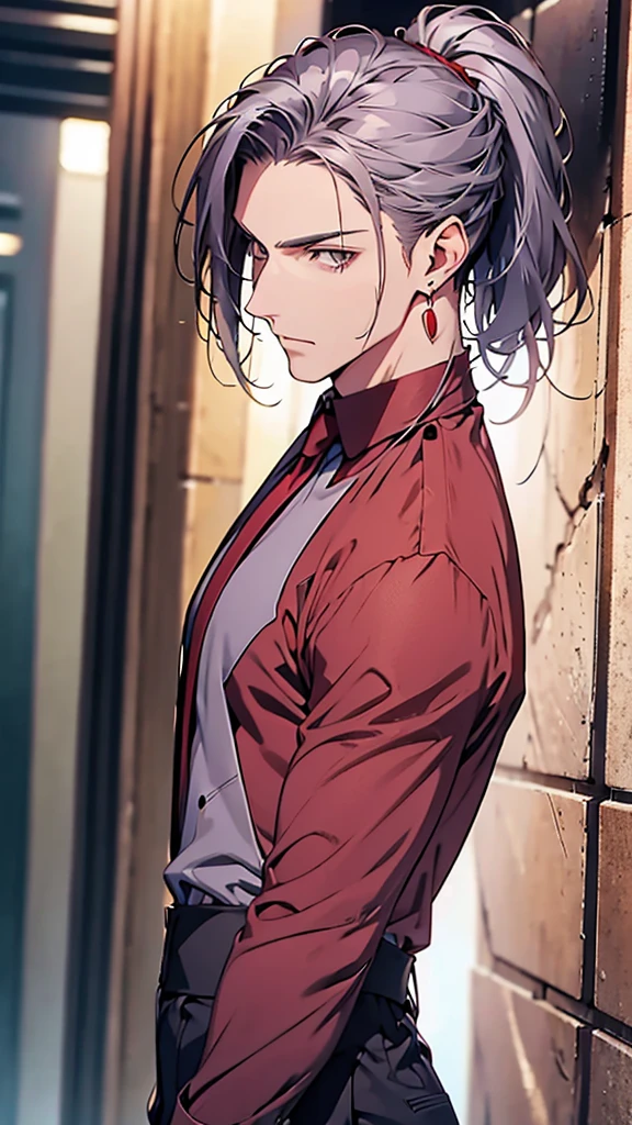 Adult man, ponytail, red and gold mosaic shirt, silver earrings