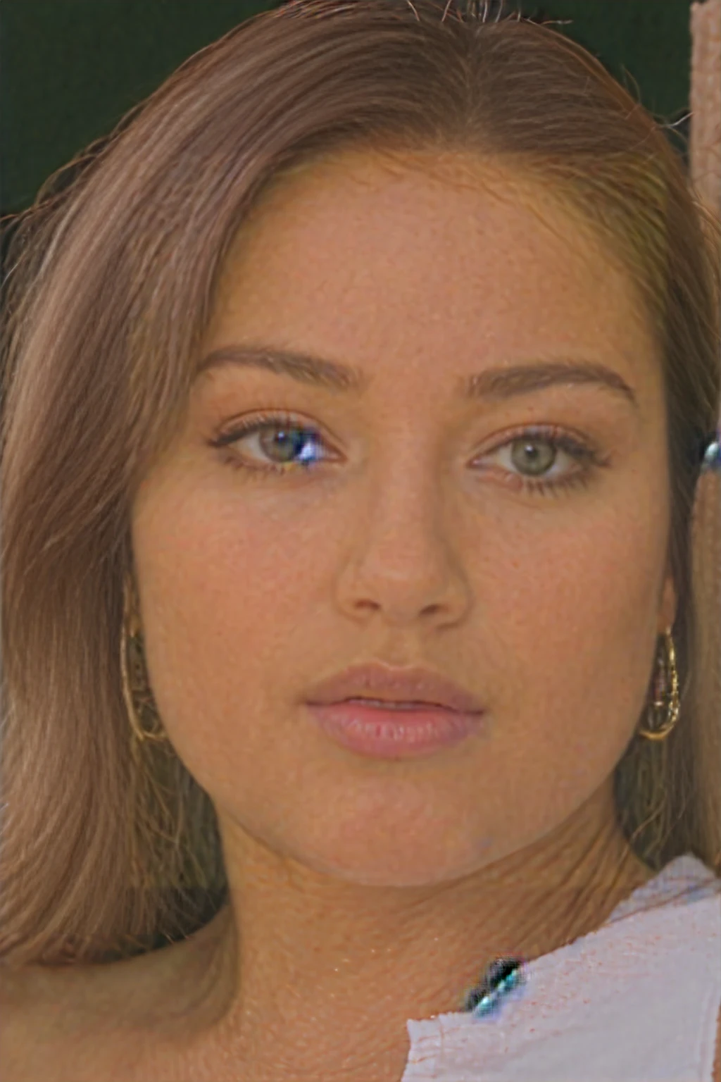 A young 19-year-old woman named Lila Nakamura with a mixed Japanese and Northern European heritage. She has thick dark black eyeliner, glossy lips, and a cute, endearing expression. She has straight, black hair with blonde highlights or a blonde tint that falls just past her shoulders, styled in a neat and polished manner. Her eyes are almond-shaped with a light, striking blue color, accentuated by subtle eyeshadow and mascara. Her skin has a light tone with a natural, fresh look, and she has a few delicate freckles across her nose. She is wearing a simple, professional outfit, consisting of a white blouse and dark jeans, and accessorized with small gold hoop earrings. The background is a neutral studio setting with soft lighting to highlight her features.
