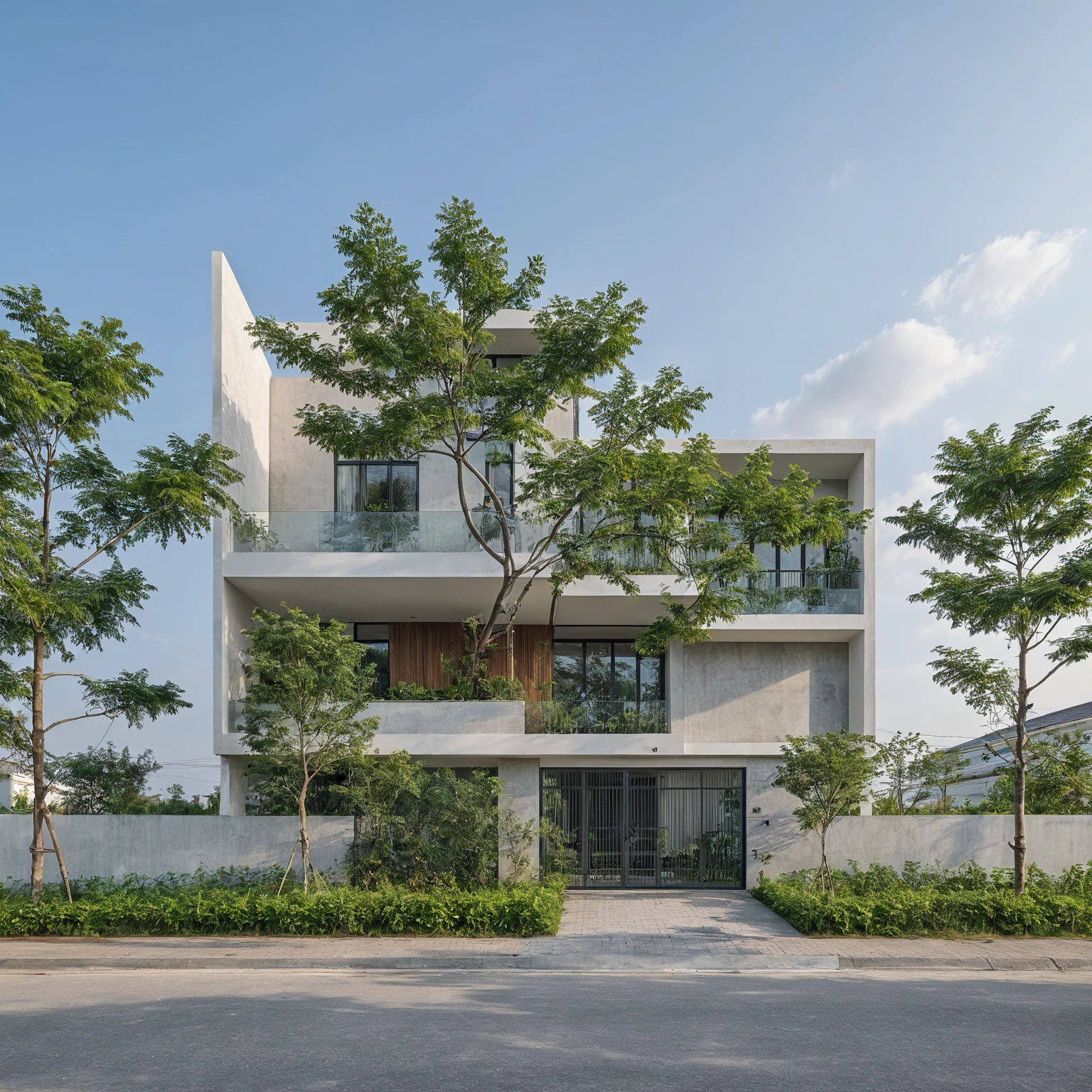 Raw photo, Masterpiece, high quality, best quality, authentic, high realistic, super detail, Realistic green tree exterior, outdoors, Tuonghoagio, house, modern stytle, on the street, wind flower wall, glass windows, GRAY STONE wall, GRAY metal gate, metal railing, house style modern on the street road, pavement, grass, trees, sky, cloud, (daylight:1.1)