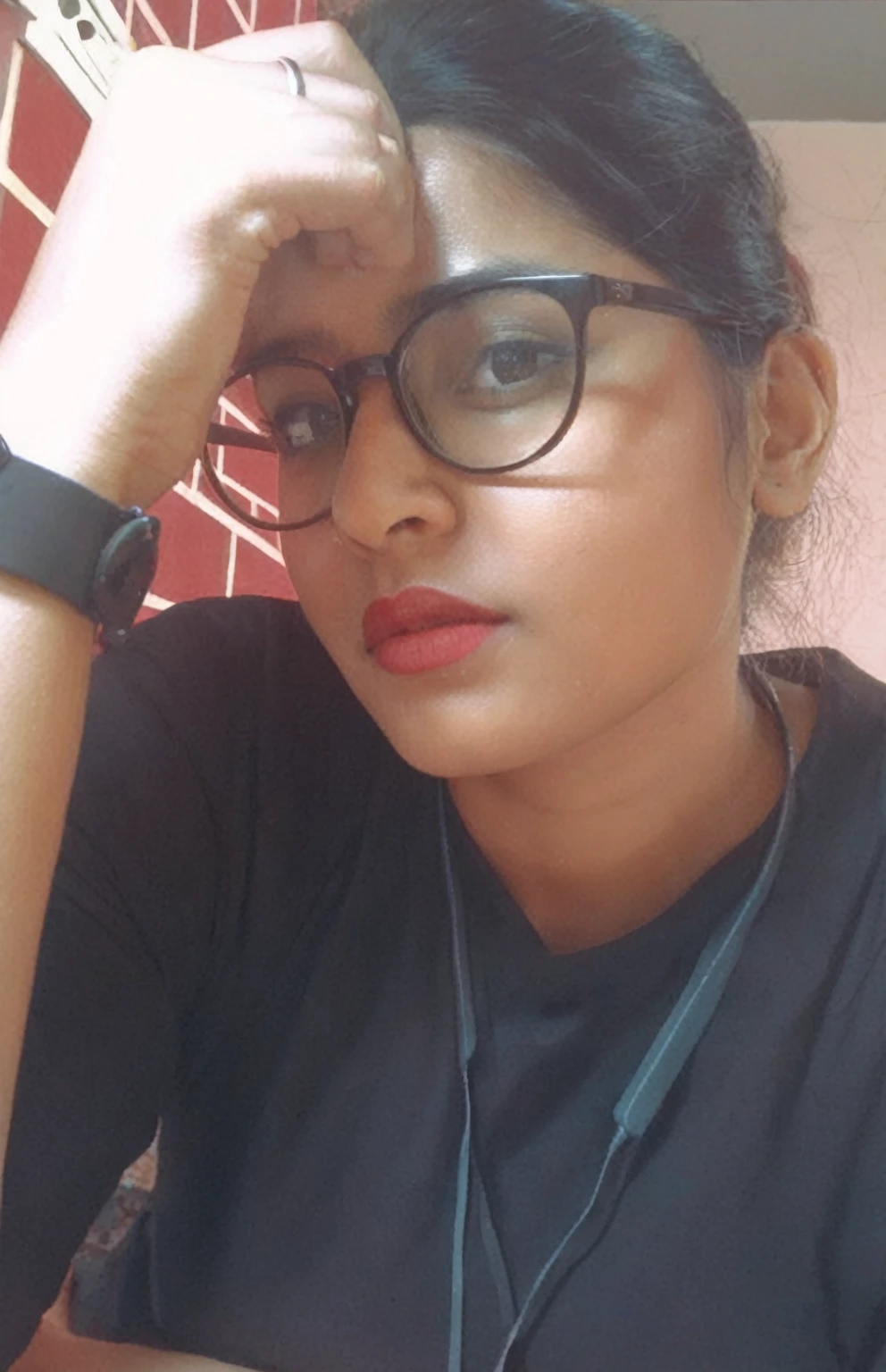 there is a woman with glasses and a black shirt posing for a picture, with accurate face, 2 7 years old, profile image, androgynous person, with glasses, 2 8 years old, 3 0 years old woman, 30 years old woman, portait photo profile picture, assamese aesthetic, candid photo, candid picture, with lovely look