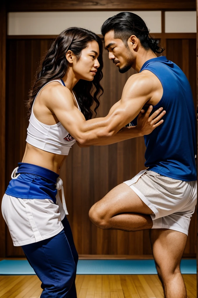 A couple where the man is Japanese, a jiu jitso fighter, and the Brazilian with long, wavy brown hair and yoga teacher