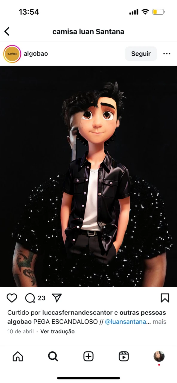 A boy in his early 20s with black hair and black eyes , slightly messy hair and shiny black blouse