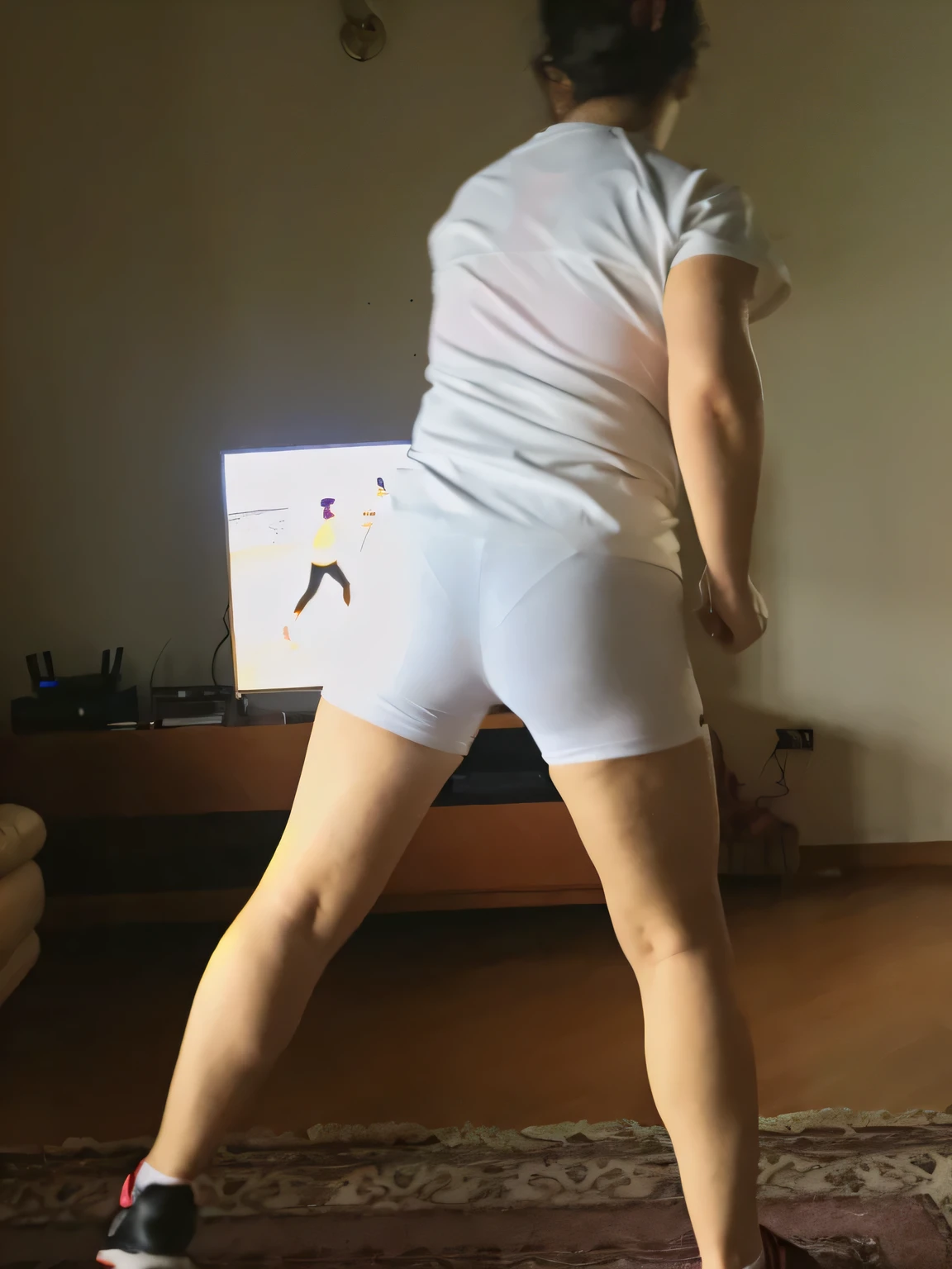 there is a woman in white shorts playing a video game, wearing white tights, wearing white leotard, long shot from back, in shorts, backshot, view from behind, dancing in the background, long shot from the back, rear-shot, view from the back, back view!!, picture from behind, back pose, from back, from the back