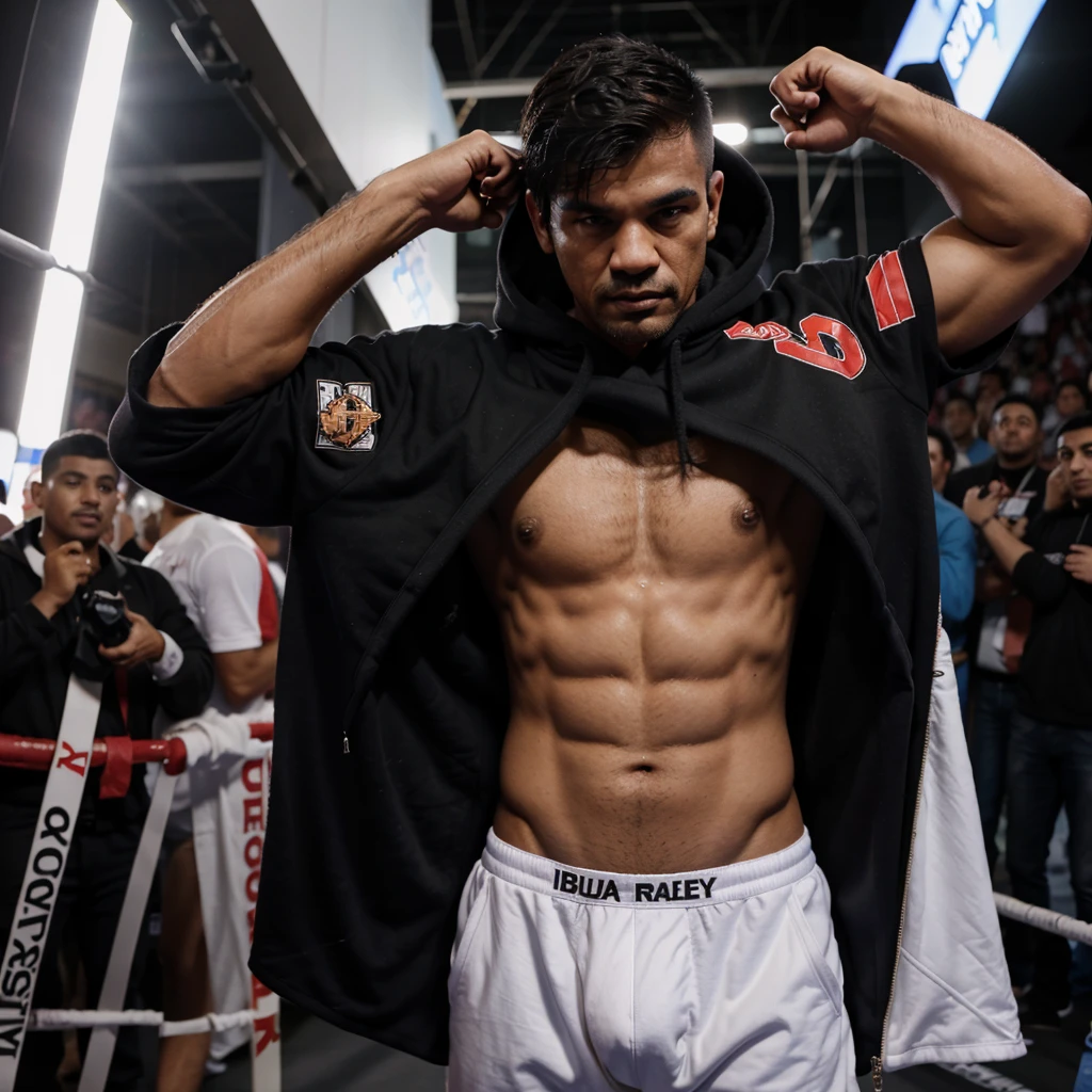 A boxer entering in the ring with a name ABDUL RAFEY written on his hoodie's back