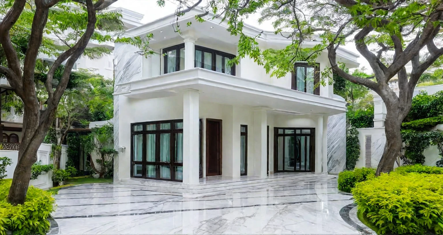 The garden villa is next to a small road, There are shade trees around, aluminum glass doors, Marble decorative border