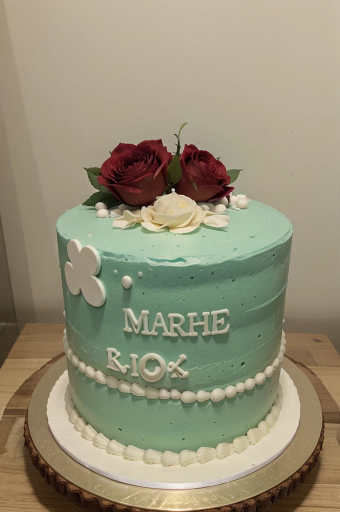 A cake with the name Mariaines