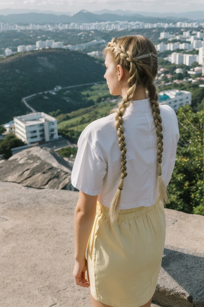 her name is Amelie, high quality, 1girl, ((20-year-old fit Caucasian woman)), ((20 years old)), ((fit)), ((Halo Braid)), pose: standing, wearing unique colored unique edgy gen Z modern wear, BACKGROUND: On top of Sugarloaf Mountain, looking out over the city and the iconic Copacabana Beach