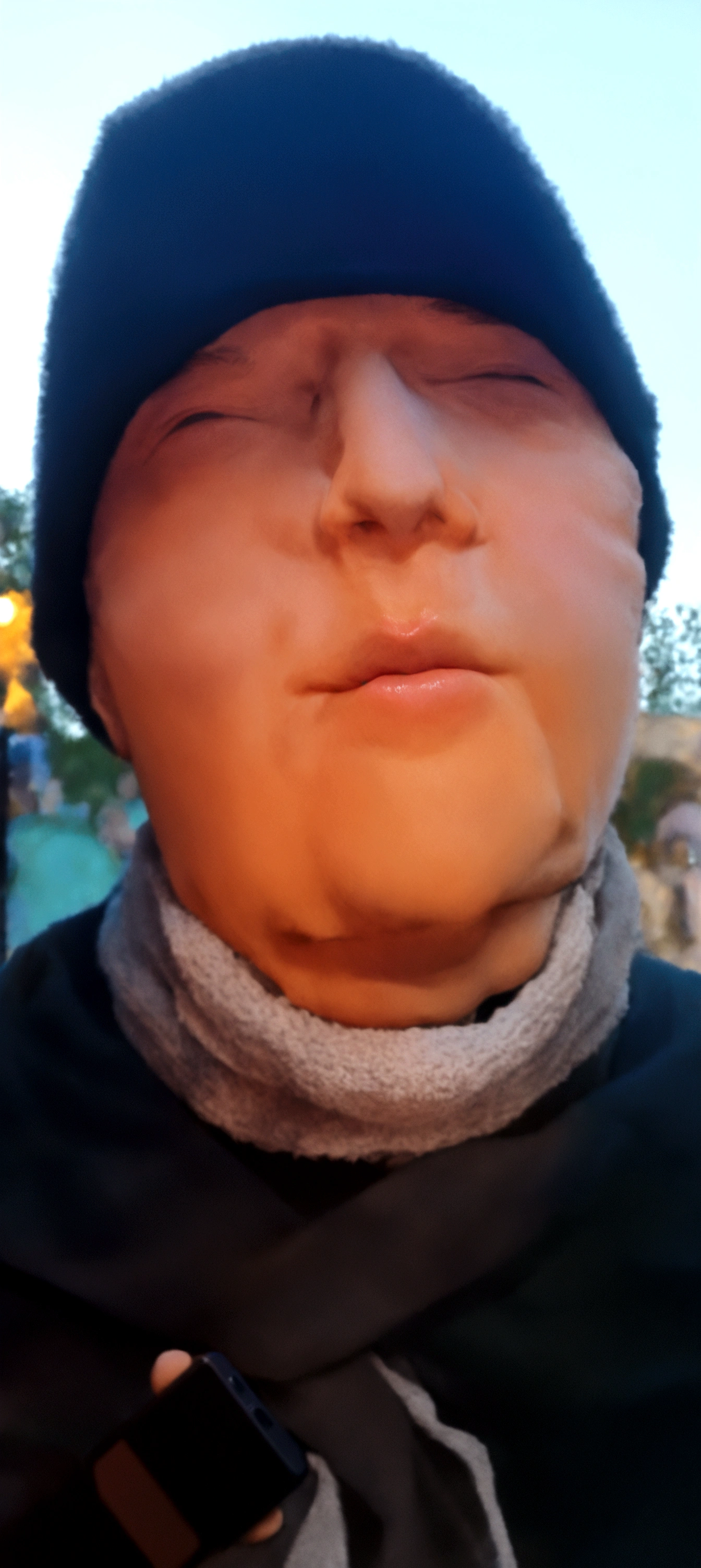 there is a man with a hat and scarf on holding a cell phone, detailed unblurred face, close up face, very very low quality picture, neck zoomed in from lips down, close up at face, portrait close up of guy, closeup shot of face, smooth chin, close up of face, wide chin, heavy grainy picture, small chin