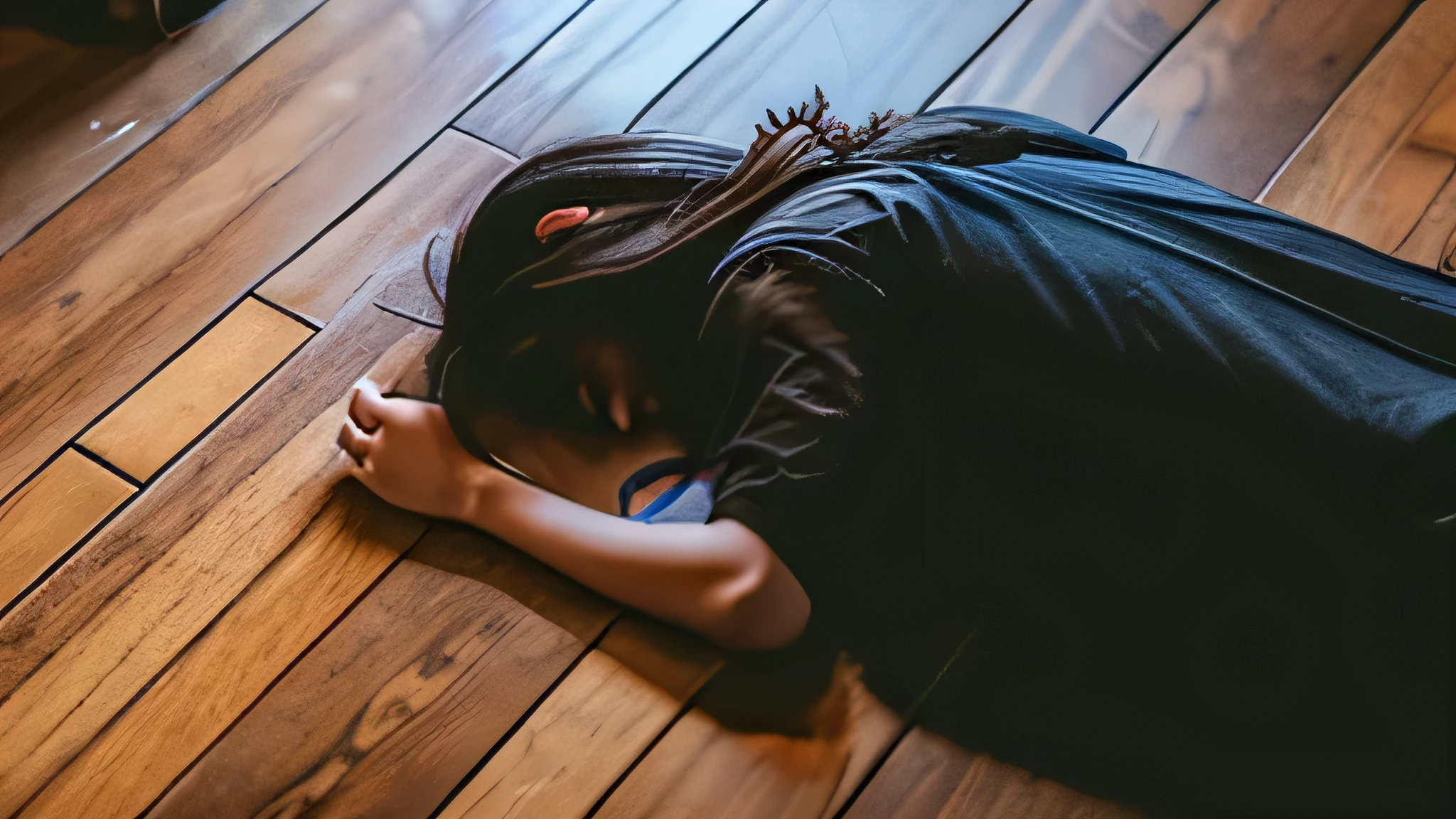 A person with long hair is lying face down, the back of his head is visible, his face is not visible, his smartphone is lying next to him, the floor is wooden, and he is looking down from above.