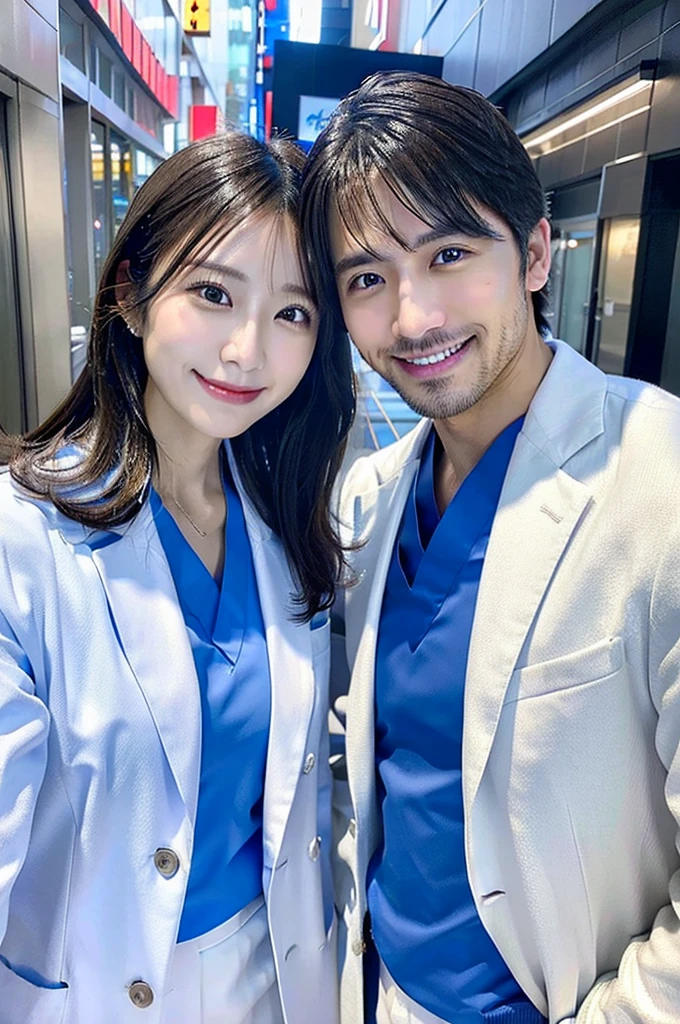 Male dentist and female dental hygienist 2people A good business partner 日本people Handsome Men and Beautiful Women Doctor wearing a white coat Upper body close-up high resolution high resolution Highest quality smile Wearing blue scrubs Take your face away