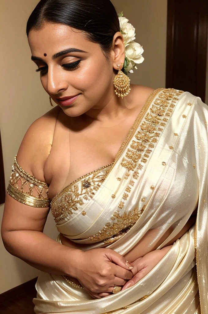 An image of Vidya Balan, wearing a white sari and a beautiful gold necklace, captures her confidence and beauty as she poses with elegance, while the large canal between her two breasts remains bashfully covered by the liquid glossy satin.

Sultry Curvy size MILF exhibitionist amorous lady with small breasts