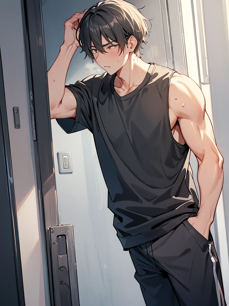 His grey clothes are black with sweat