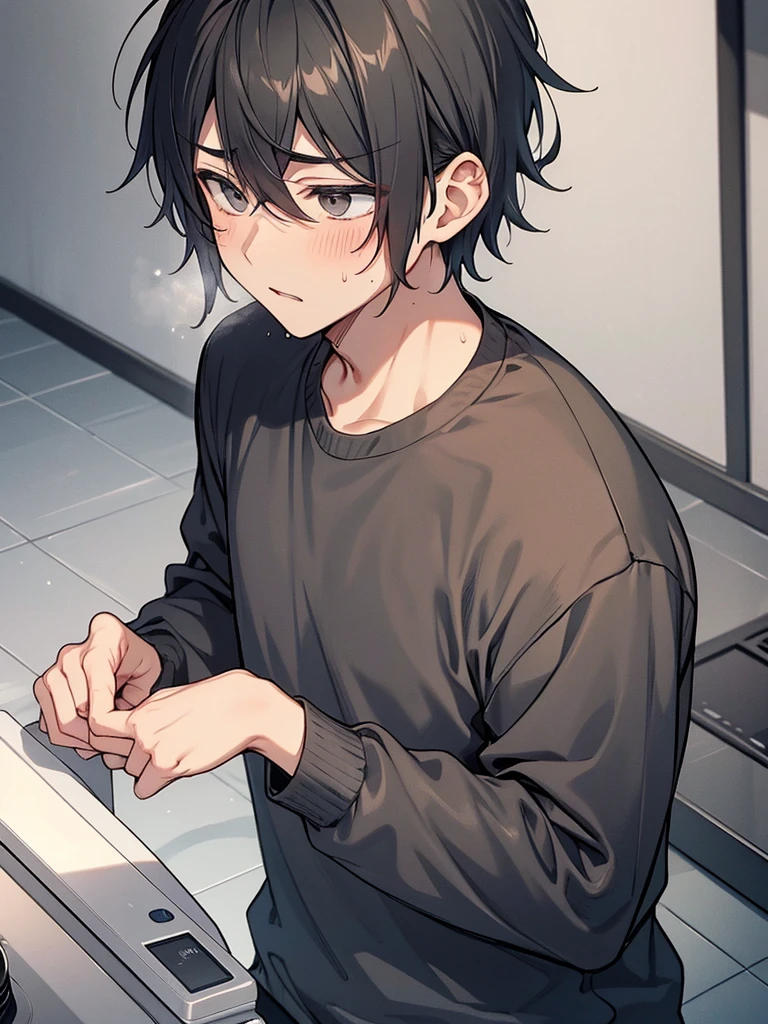 His grey clothes are black with sweat