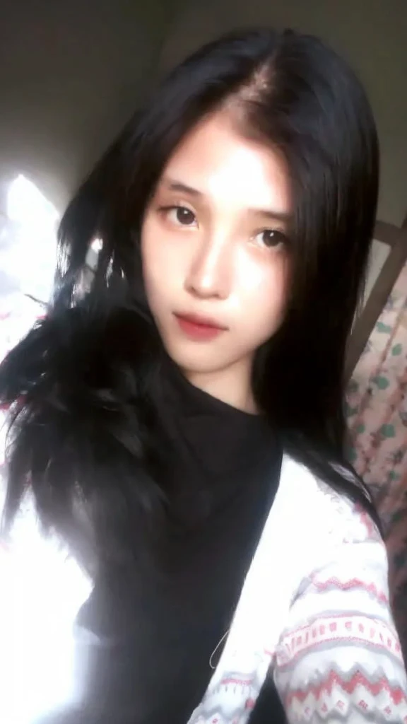 25 year old woman black hair black eyes white skin