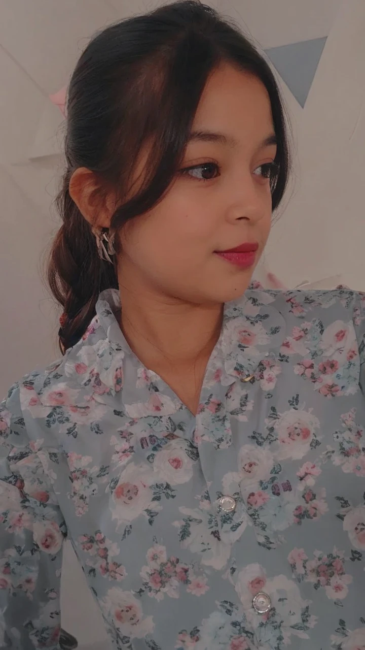 Cute girl 10 years old with a dog in a cute dress
In a room with a boy of 10 years