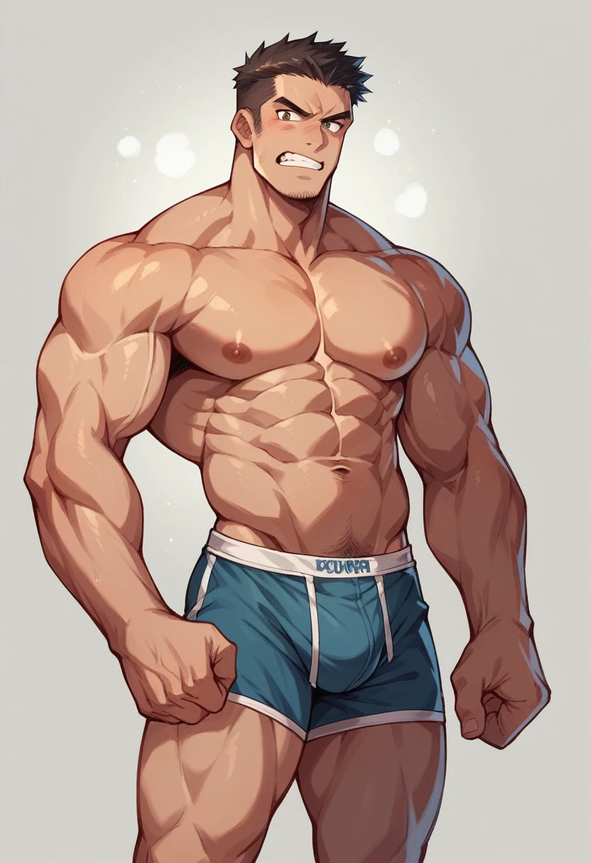 Muscle man with a boxer squeezing his parts 