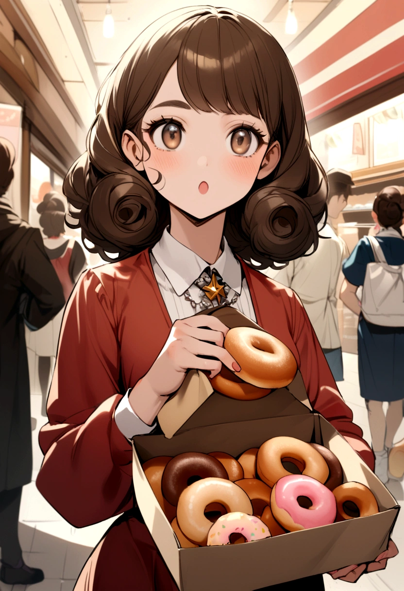 a brown curly girl holding a box of Disney-style donuts