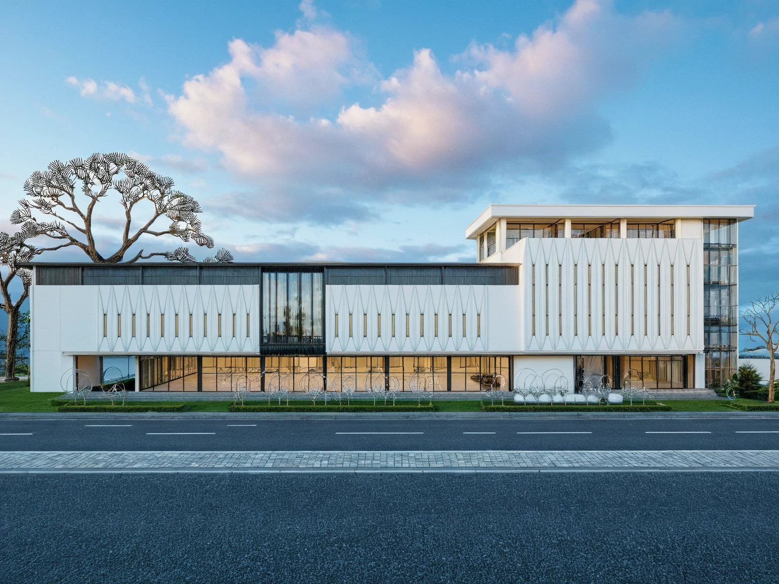 Masterpiece, high quality, best quality, authentic, super detail, outdoors, house style neoclassic, wedding center, white wall, glass windows, gate road, pavement, grass, trees, blue sky, sunset, cloud, (day:1.1), realistic lighting