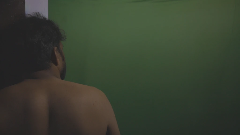 there is a man standing in front of a mirror looking at himself, shot from cinematic, side profile in underwater, closeup cinematic aquatic scene, cinematic film still, photo still of behind view, a still of an ethereal, cinematic body shot, in a underwater horror scene, cinematic movie shot, 4 k film still, in a movie still cinematic, making of