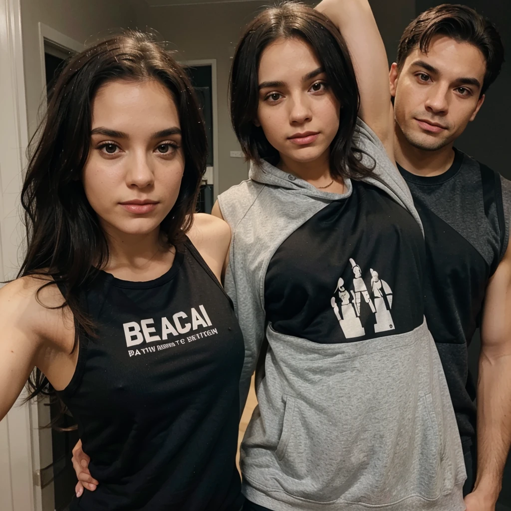 Selfie of a woman with a black tank top and  and a man with a sweatshirt next to her