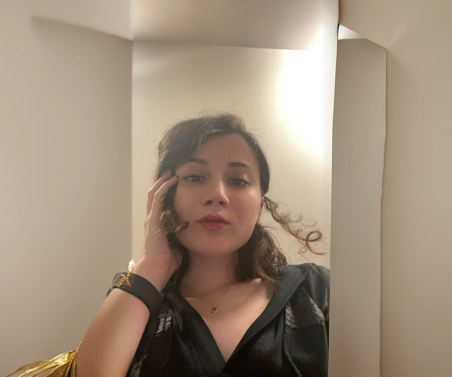 empty white wall, gold canvas on all borders of the picture