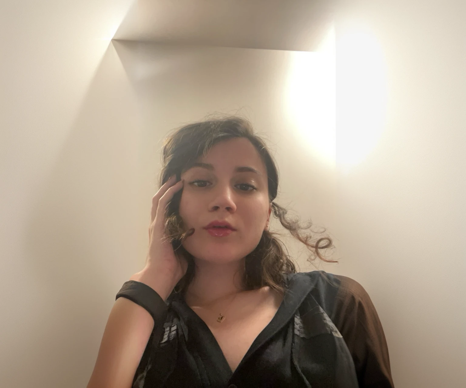 empty white wall, gold canvas on all borders of the picture