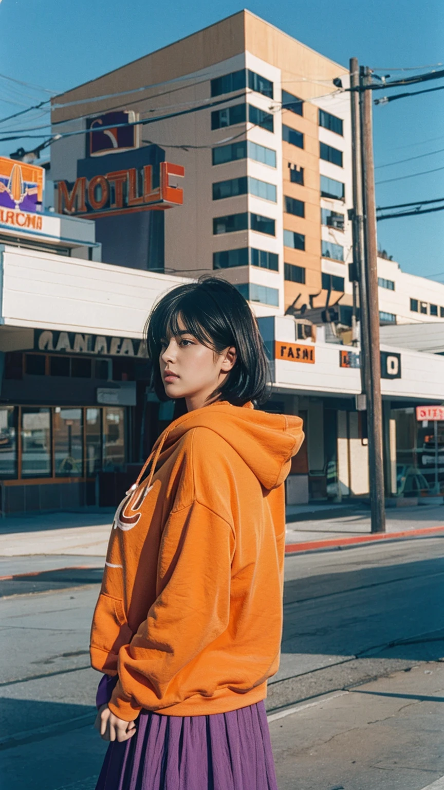 long shot portrait of cute 23 yo girl, (natural big breast) ,wear ((orange color oversized hoodie)), wear ((purple tennis skirt)),looking front,Best Quality,Masterpiece,Ultra High Resolution,(Realisticity:1.4),Original Photo, 1Girl, light leak,ultra high resolution,UHD,beautiful, (black bob hair), almond eye, no makeup, in front of (80's mondrian architecture motel), (realistic:1.2), (surreal:1.3), (very detailed:1.1), ((masterpiece)),summer, blue sky, palm trees,sunny, los angles vibes,film camera, 800mm lens,style of Philip Lorca diCorcia