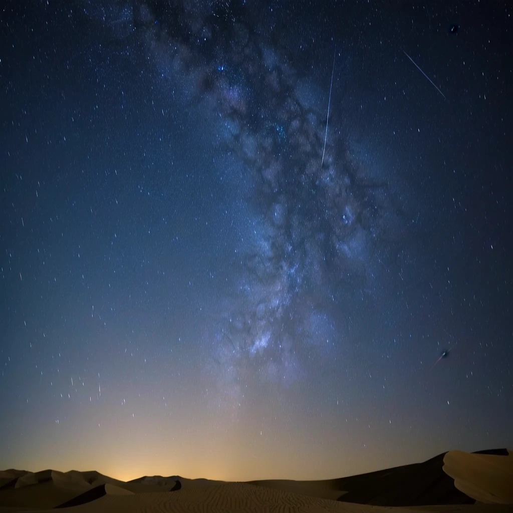 a view of a desert with a few stars in the sky, perseides meteor shower, meteors are falling from the sky, meteor shower, meteors falling, shooting star in background, sky strewn with stars, night sky with many meteorites, meteors, on a clear magnificent night sky, during a meteor storm, stars in sky, stars and planets visible