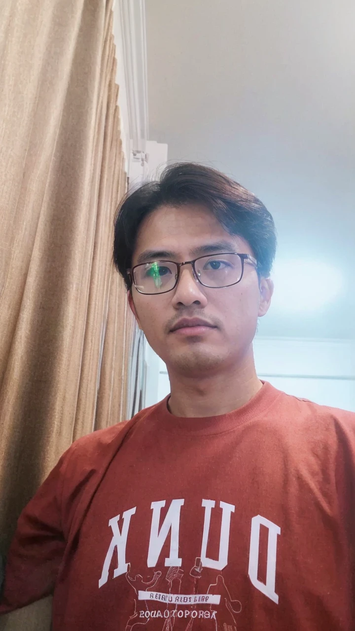 (best quality,4k,highres),ultra-detailed,realistic,portrait,detailed glasses,lawyer,office,legal documents,books,serious expression,professional appearance,Asian man,wearing suit and tie,stylish office furniture,wooden bookshelves,classy interior design,horizontal lighting,calm and composed,bookish atmosphere,neutral color palette