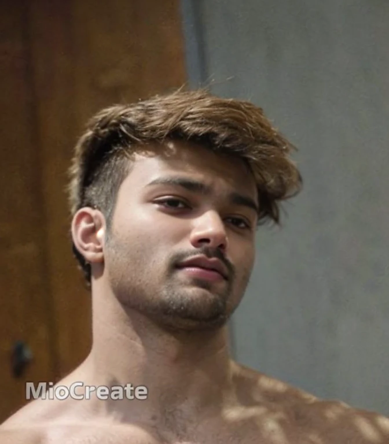 A beautiful young bearded man with highly detailed skin.black hair.happy emotion