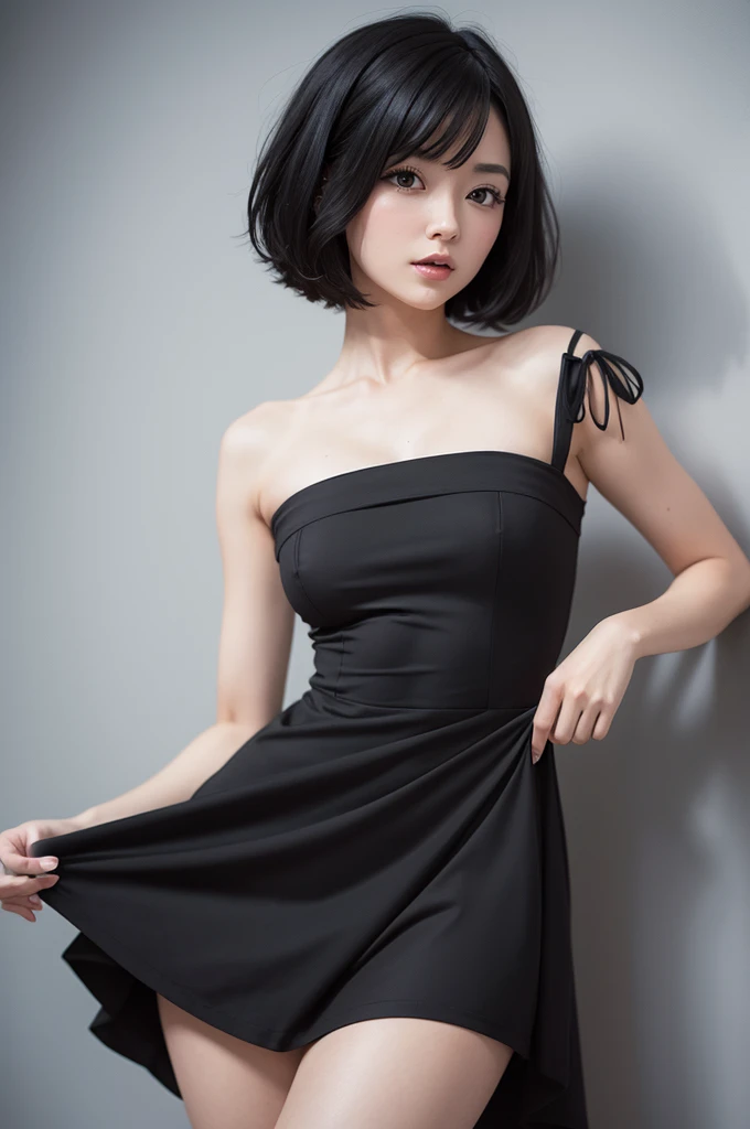 with short black hair and a dress about to fall off