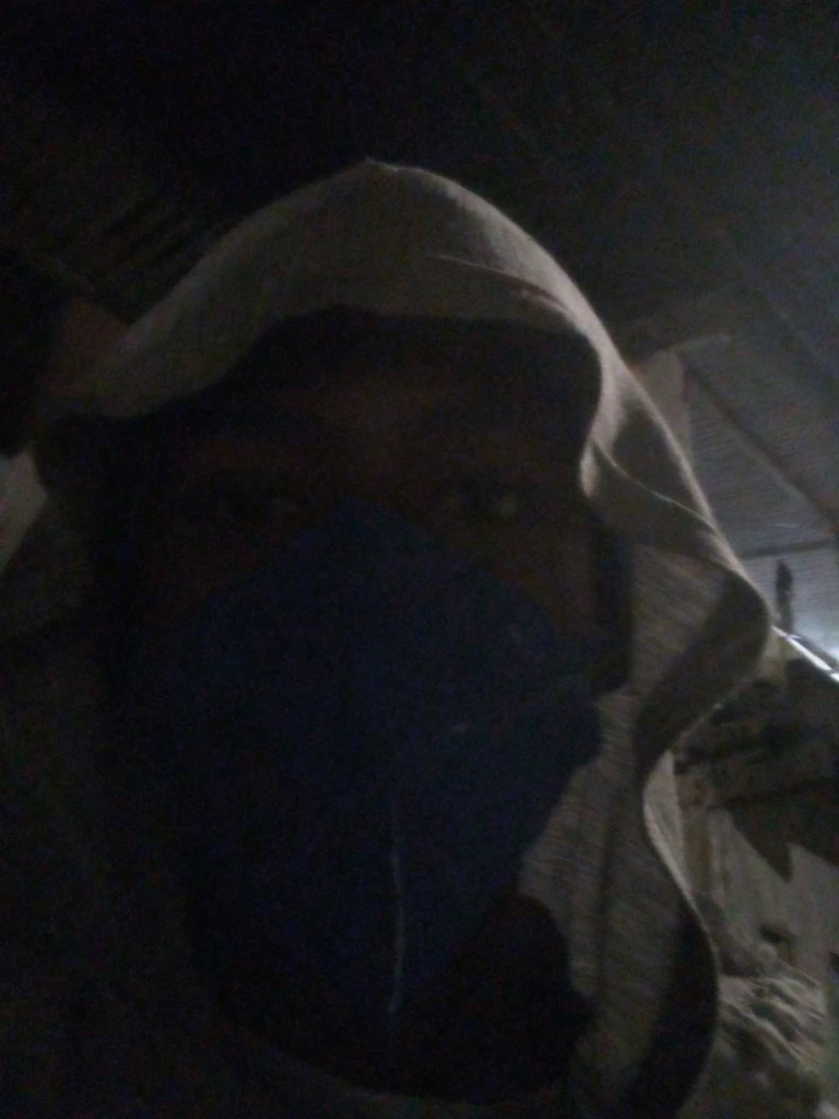 arafed man in camouflage jacket and black hat standing in front of a brick wall, kendrick lamar, : kendrick lamar, taken in the early 2020s, profile shot, photo shoot, grime, bladee from drain gang, album photo, frank ocean, riyahd cassiem, teddy fresh, heron preston, profile image, album art, sitting down