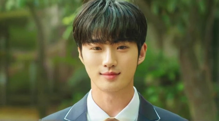 A handsome Korean guy wearing a business suit