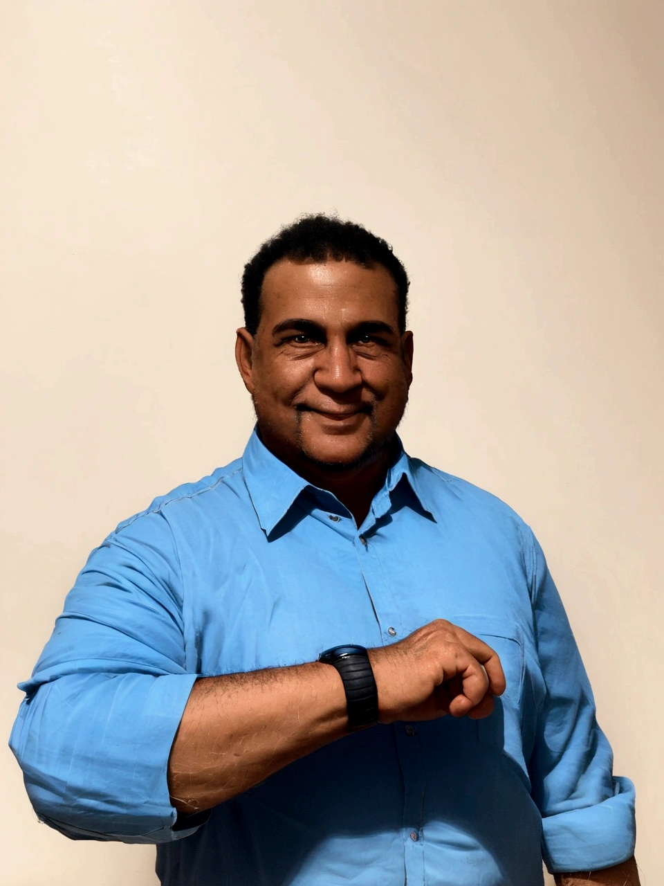 there is a man in a blue shirt is holding a smart watch, professional picture, professional profile picture, riyahd cassiem, headshot profile picture, profile picture, taken in the early 2020s, profile picture 1024px, mohamed chahin, album photo, headshot photo, professional profile photo, detailed professional photo, news reporter anthony conn