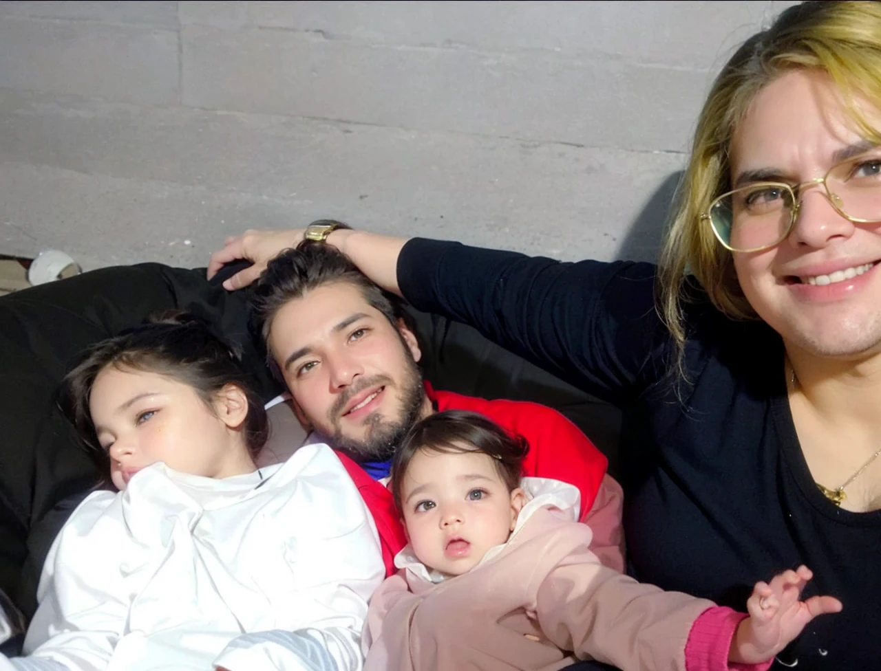 I want a cell phone wallpaper photo that is of a family of 4 , with the following descriptions: a tall chubby woman with chocolate hair color copper green eyes, tall thin man black hair with beard brown eyes, 9 month old girl brown hair brown eyes and 4 year old boy brown hair brown eyes.
all together hugged