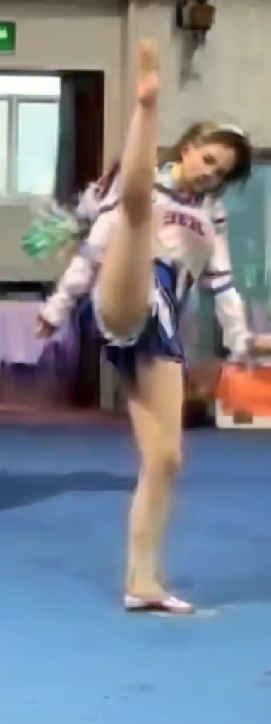 (real,Highest quality)A beautiful female cheerleader,Short skirt,Big ,High kicking action