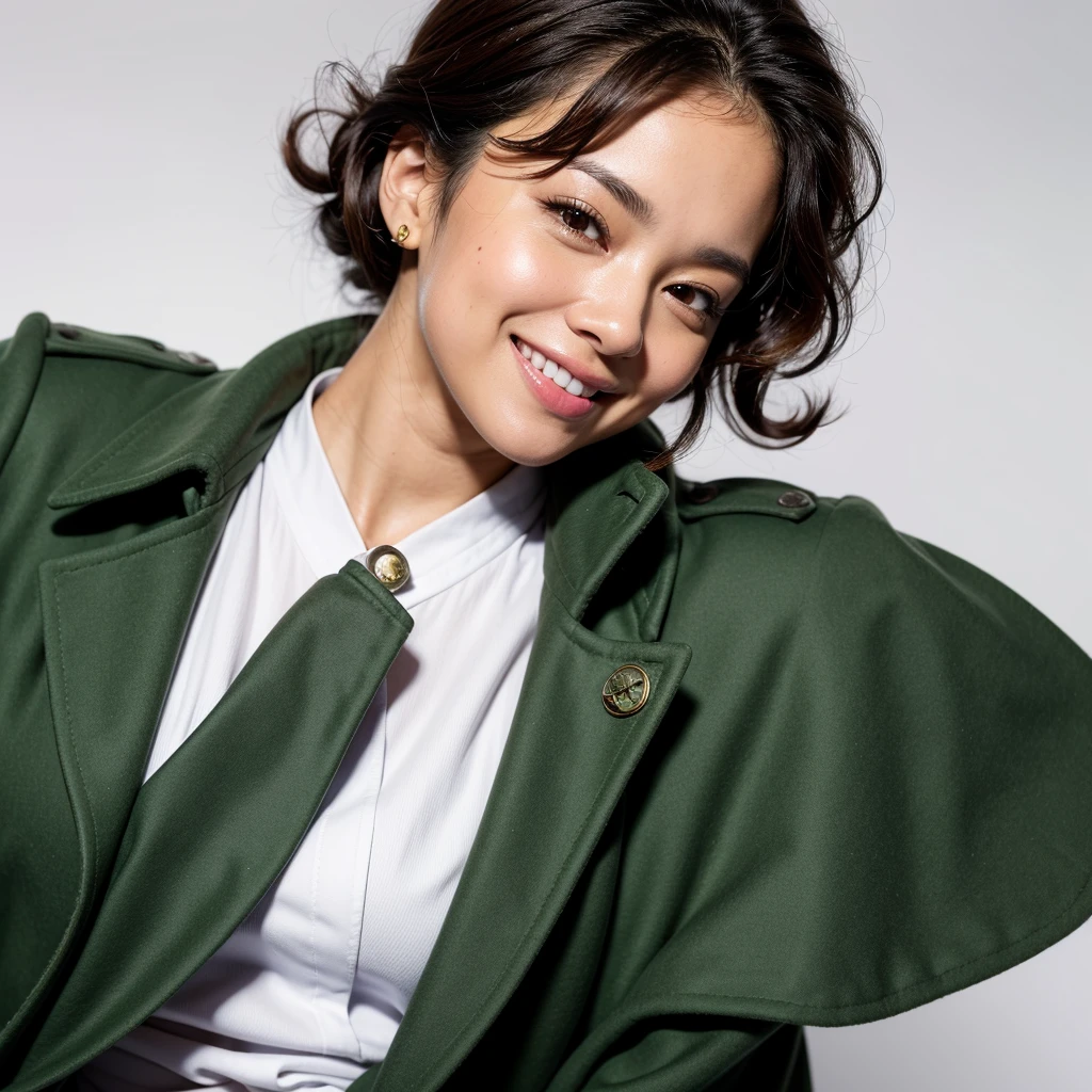 Nurse with marine green coat, thick, curly dark brown hair, mulatto complexion, ice-colored eyes, with a big beautiful smile, arms folded and head tilted to the right side. The white background