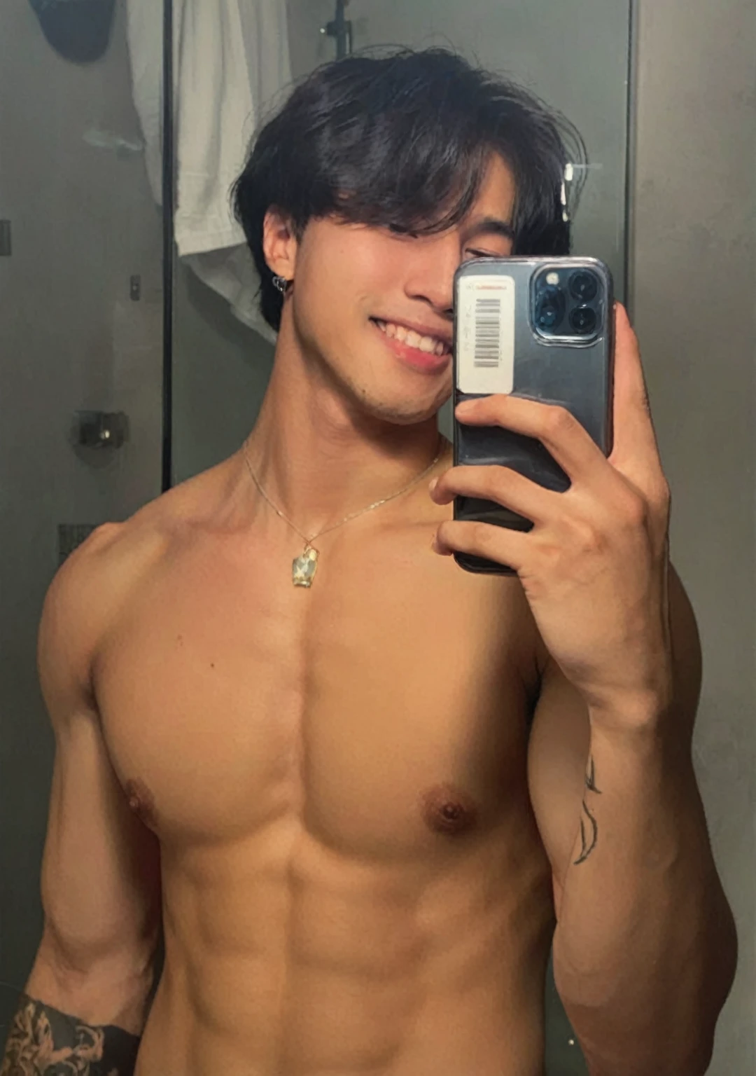 Man with Korean features and looks like BTS singer Jungkook, taking selfie in the mirror, appears to be 23 years old and has shaved hair on the side, on the ruler.