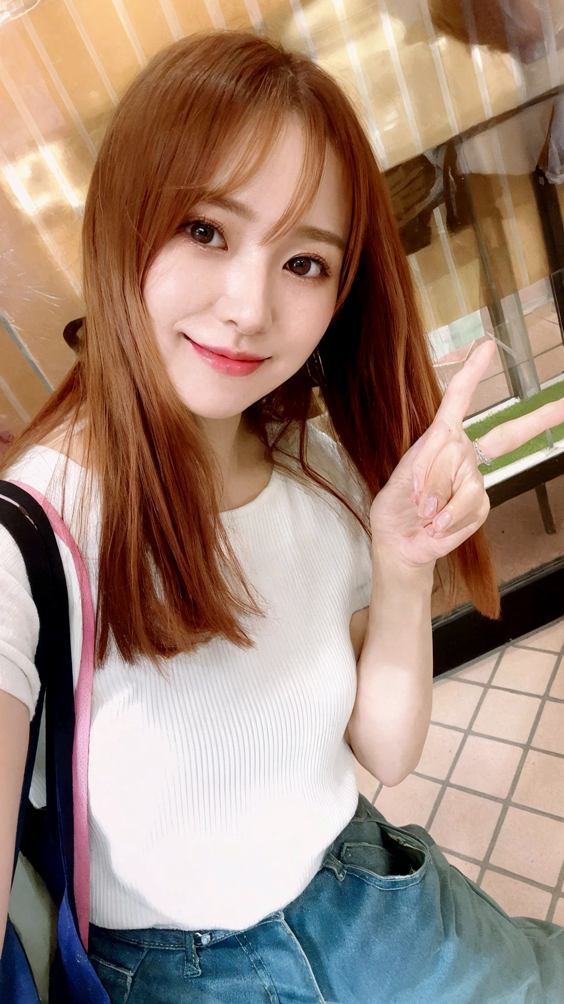 A woman in her fifties with long red hair sitting on a bench and holding a mobile phone, Chiho, 🚿🗝📝, Yoshitomo Nara, with cute - fine - face, sakimichan, cute:2, Hime cut, With index finger, aoshima Chiho, TWICE&#39;s Tzuyu、Blonde