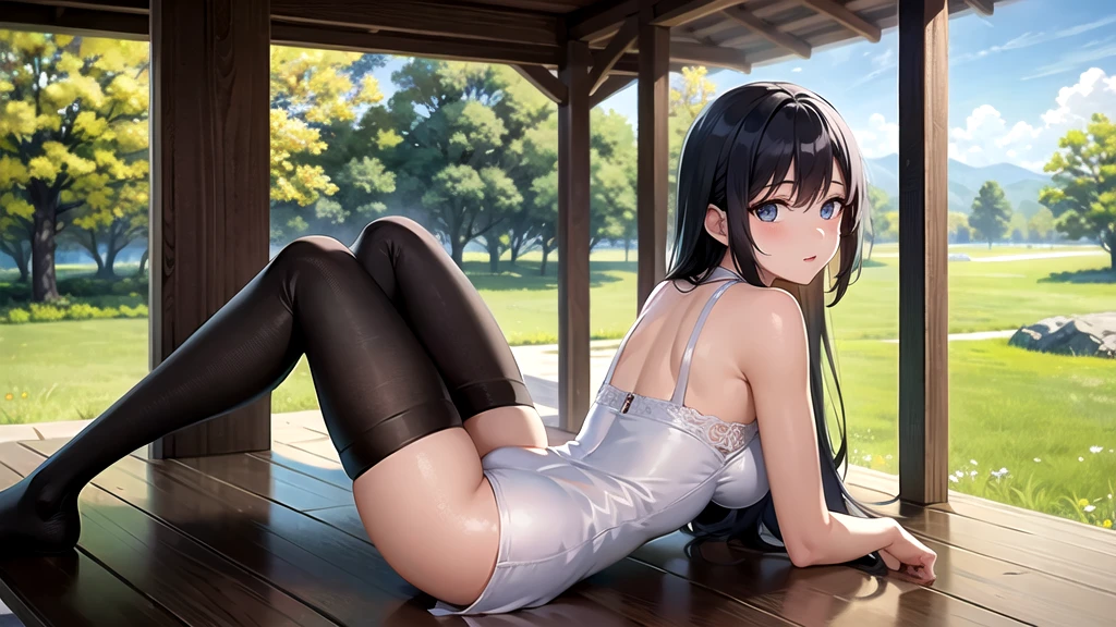 A girl resting on a scenic plain