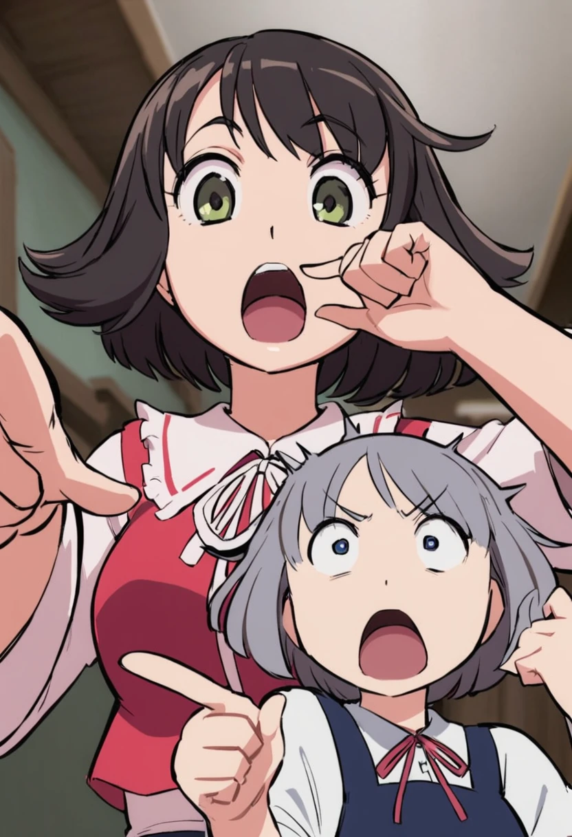 Woman pointing at something in her hand with surprised face with short hair looking at herself from half body up