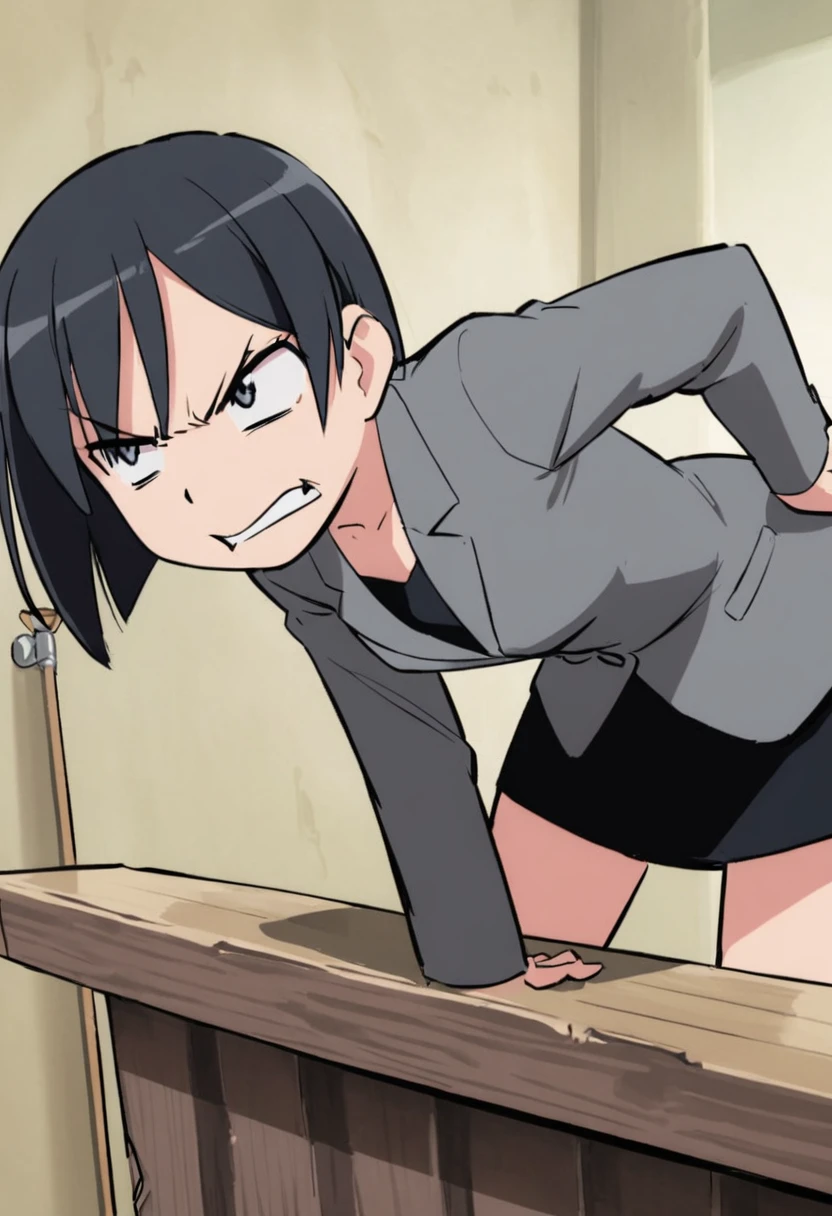 Woman with short hair and gray jacket leaning forward with angry face